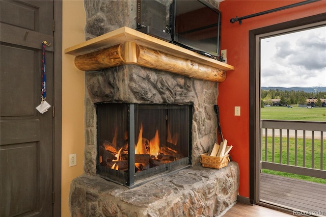 397 County Road 834 Unit 8, Fraser, CO 80442 - detailed view of a stone fireplace and wood finished floors
