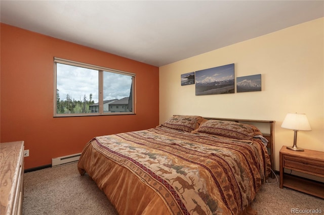 397 County Road 834 Unit 8, Fraser, CO 80442 - bedroom featuring baseboard heating, light carpet, and baseboards