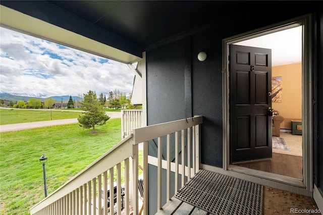 397 County Road 834 Unit 8, Fraser, CO 80442 - entrance to property with a mountain view, a lawn, and stucco siding