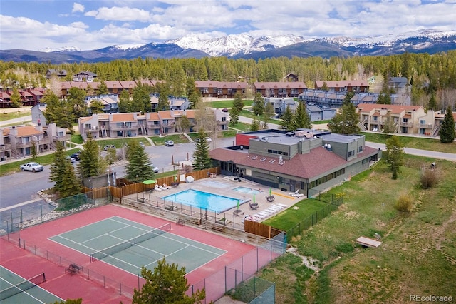 397 County Road 834 Unit 8, Fraser, CO 80442 - aerial view of residential area with mountains and a pool area