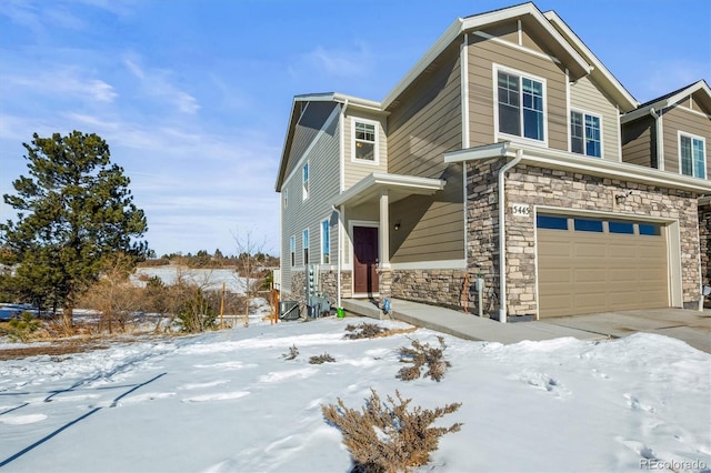 view of front of property with a garage