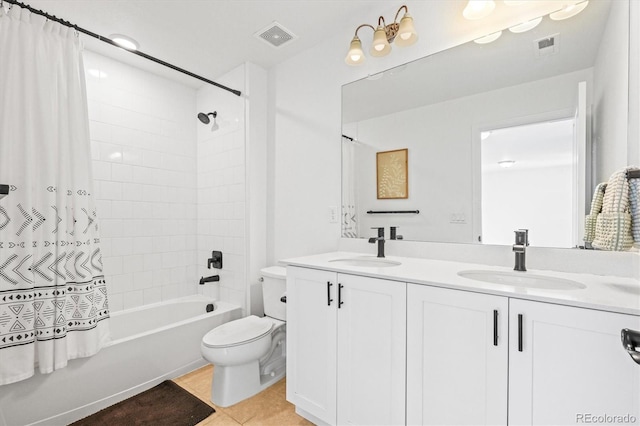 full bathroom with toilet, shower / bath combo with shower curtain, tile patterned floors, and vanity