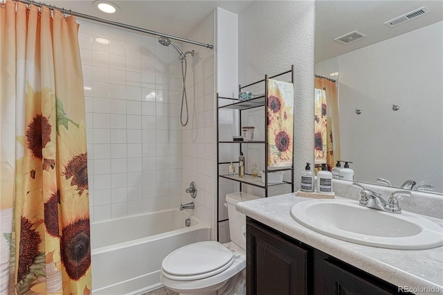 full bath featuring toilet, visible vents, shower / bath combination with curtain, and vanity