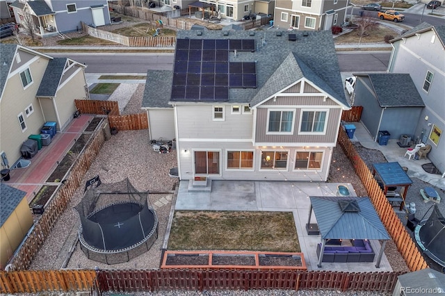 birds eye view of property with a residential view