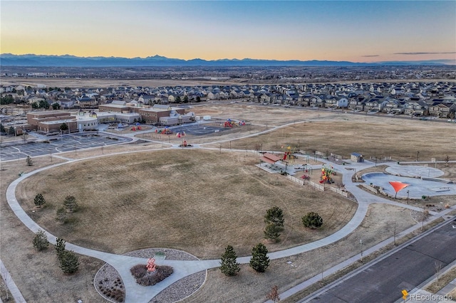 bird's eye view with a residential view and a mountain view