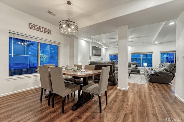 dining area with baseboards, visible vents, wood finished floors, and recessed lighting