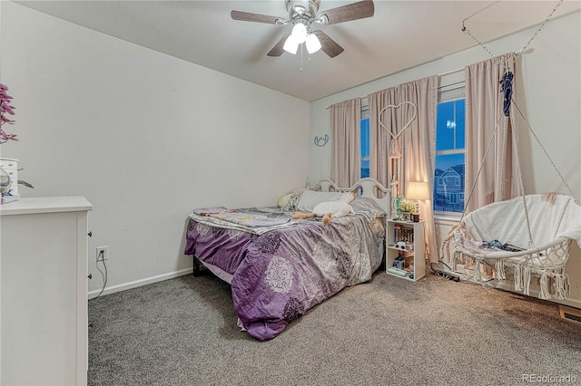 bedroom with carpet floors, ceiling fan, and baseboards