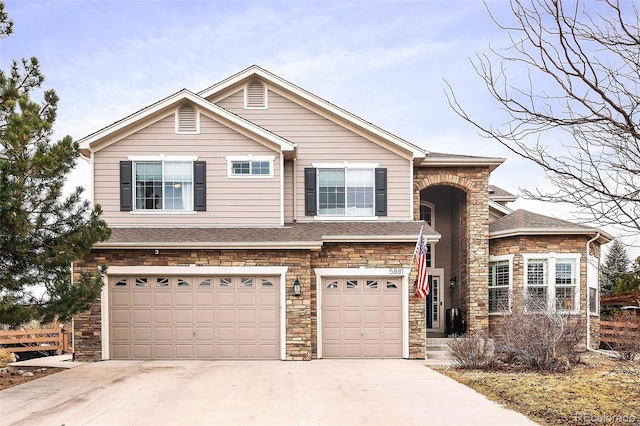 view of front of property featuring a garage