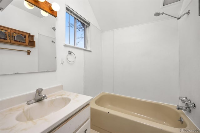 2514 N Humboldt St, Denver, CO 80205 - full bathroom with vanity, vaulted ceiling, and shower / bathtub combination