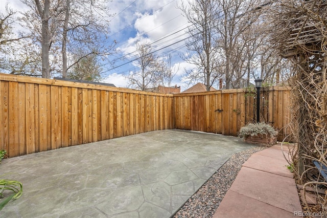 2514 N Humboldt St, Denver, CO 80205 - fenced backyard featuring a patio area