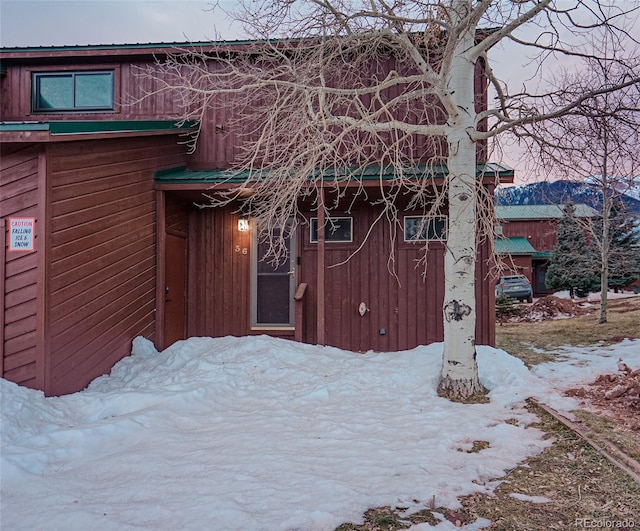 view of snow covered property