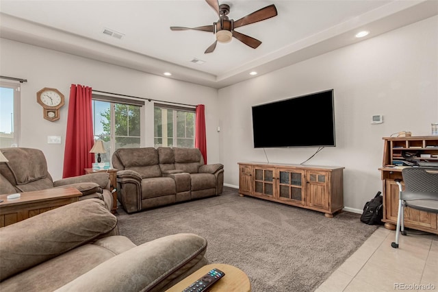 5568 Ceylon St, Denver, CO 80249 - carpeted living room with ceiling fan, recessed lighting, and tile patterned flooring