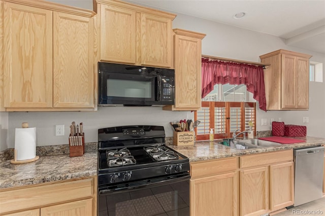 5568 Ceylon St, Denver, CO 80249 - kitchen featuring black appliances and light brown cabinetry