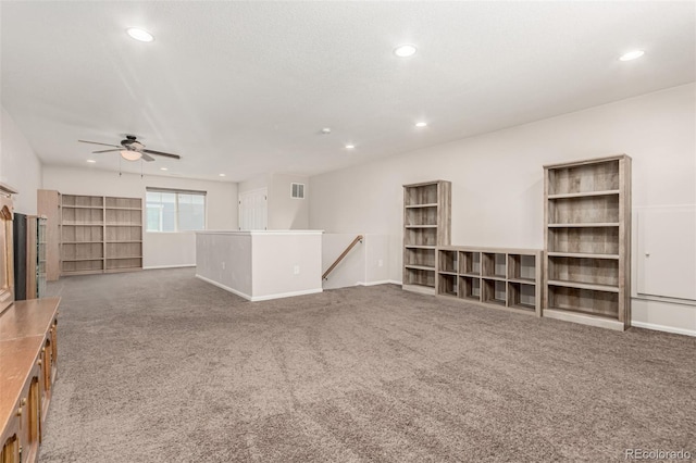 5568 Ceylon St, Denver, CO 80249 - unfurnished living room with carpet flooring, a ceiling fan, and recessed lighting