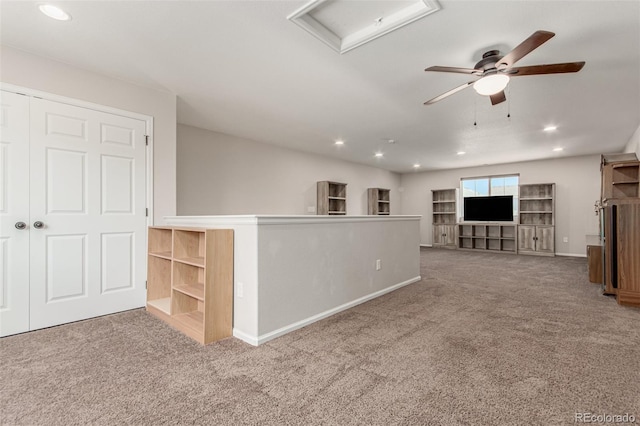 5568 Ceylon St, Denver, CO 80249 - interior space with carpet flooring, attic access, and recessed lighting