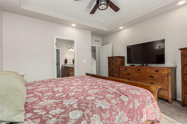 5568 Ceylon St, Denver, CO 80249 - bedroom with carpet flooring, recessed lighting, a tray ceiling, ceiling fan, and ensuite bathroom