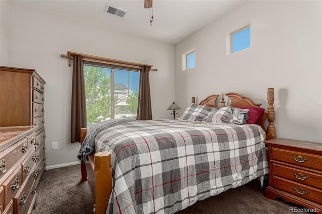 5568 Ceylon St, Denver, CO 80249 - bedroom with dark carpet and a ceiling fan