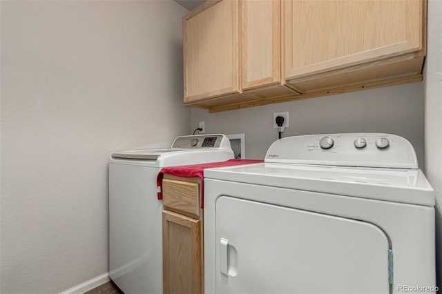 5568 Ceylon St, Denver, CO 80249 - laundry room with cabinet space and washer and clothes dryer