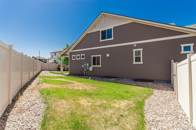 5568 Ceylon St, Denver, CO 80249 - rear view of property with a fenced backyard