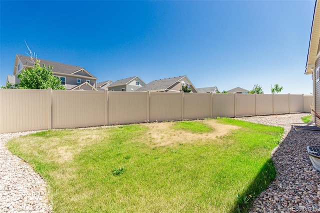 5568 Ceylon St, Denver, CO 80249 - fenced backyard with a residential view
