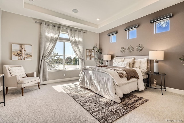 4955 N Picadilly Ct, Aurora, CO 80019 - carpeted bedroom featuring baseboards, a raised ceiling, and recessed lighting