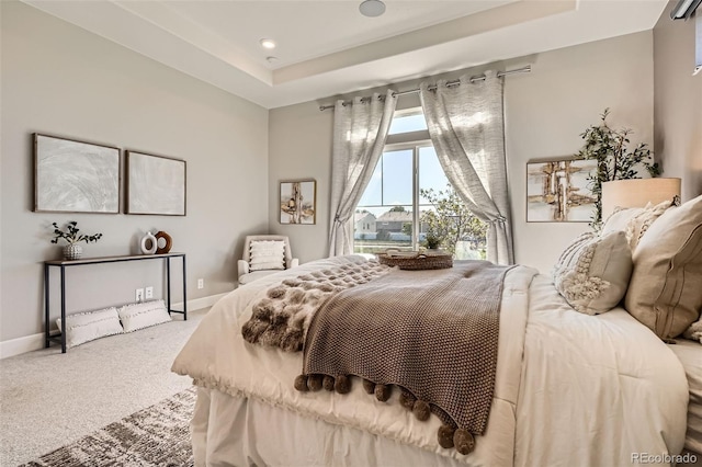 4955 N Picadilly Ct, Aurora, CO 80019 - bedroom with carpet flooring, a raised ceiling, baseboards, and recessed lighting