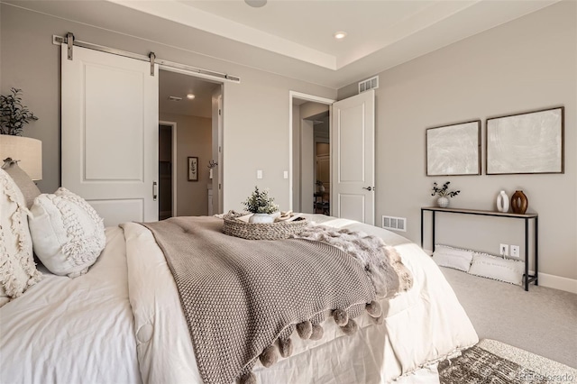 4955 N Picadilly Ct, Aurora, CO 80019 - carpeted bedroom featuring recessed lighting and a barn door