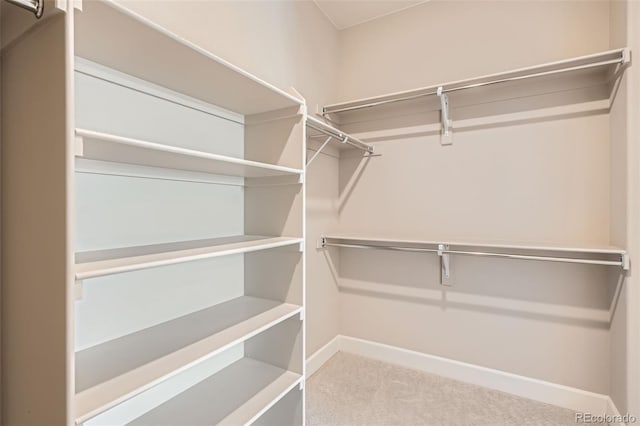 4955 N Picadilly Ct, Aurora, CO 80019 - spacious closet with carpet floors