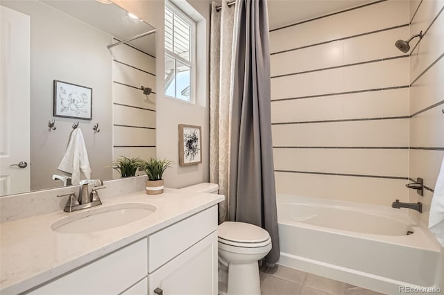 4955 N Picadilly Ct, Aurora, CO 80019 - full bath with shower / bath combination with curtain, toilet, tile patterned floors, and vanity