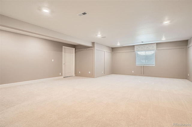 4955 N Picadilly Ct, Aurora, CO 80019 - below grade area featuring light carpet, recessed lighting, and baseboards