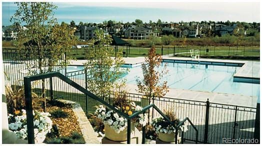 community pool with fence
