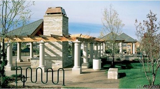 view of home's community with a pergola