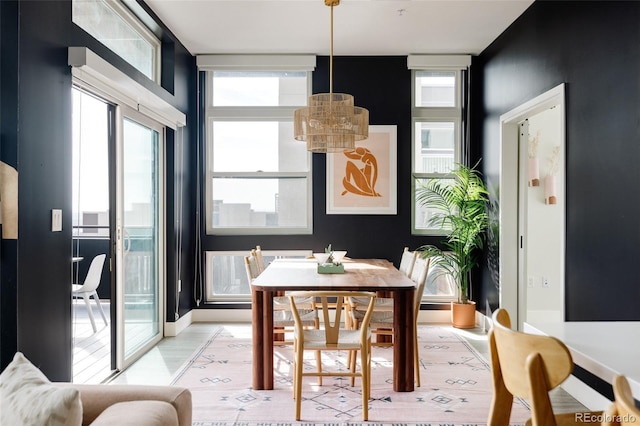 dining room with light hardwood / wood-style flooring