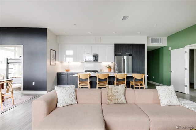 living room with light wood-type flooring