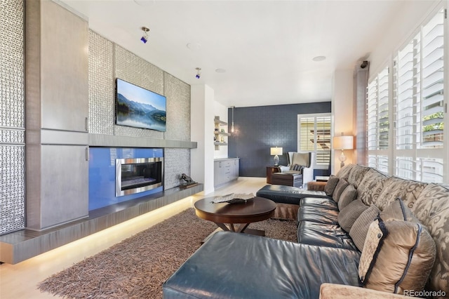 living room featuring a fireplace