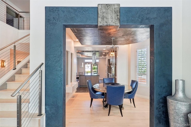 dining room featuring a chandelier and light hardwood / wood-style floors