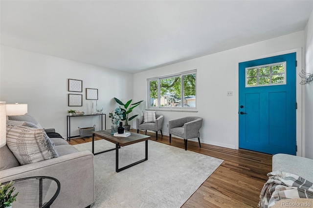 6088 Quail Ct, Arvada, CO 80004 - living area featuring wood finished floors and baseboards