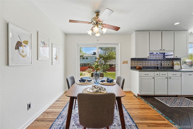 6088 Quail Ct, Arvada, CO 80004 - dining space featuring baseboards, a ceiling fan, light wood-type flooring, and recessed lighting