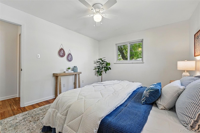 6088 Quail Ct, Arvada, CO 80004 - bedroom featuring light wood-style flooring, baseboards, and a ceiling fan