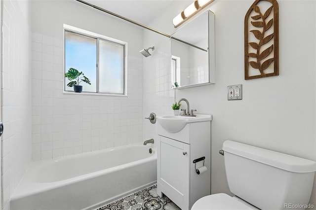 6088 Quail Ct, Arvada, CO 80004 - bathroom with toilet, tub / shower combination, vanity, and tile patterned flooring