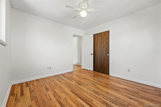 6088 Quail Ct, Arvada, CO 80004 - spare room featuring baseboards, light wood finished floors, and ceiling fan