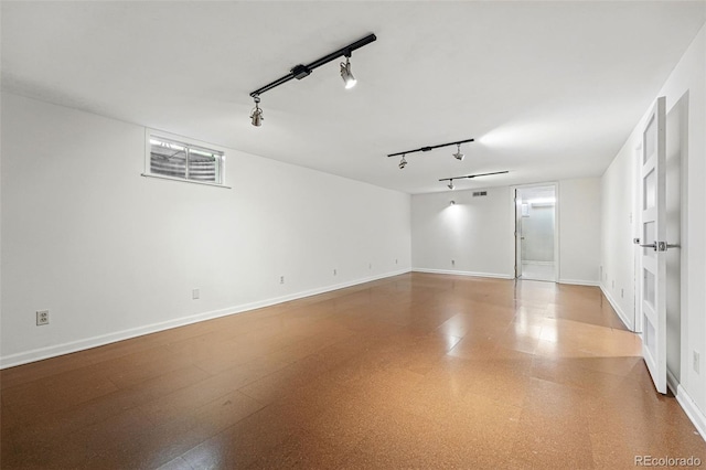 6088 Quail Ct, Arvada, CO 80004 - unfurnished room with rail lighting and baseboards