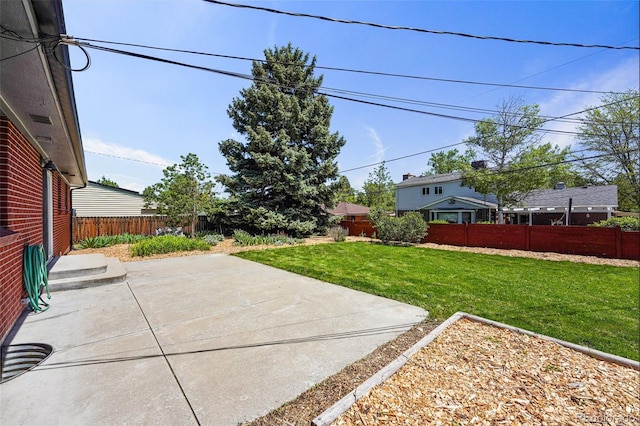 6088 Quail Ct, Arvada, CO 80004 - view of yard featuring a patio area