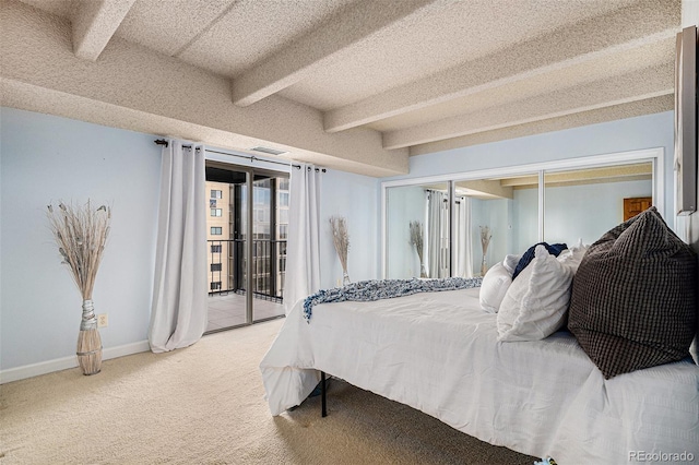 bedroom with access to exterior, baseboards, beam ceiling, carpet flooring, and a textured ceiling