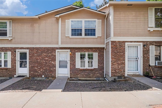 1534 S Ouray Cir Unit B, Aurora, CO 80017 - view of property featuring brick siding