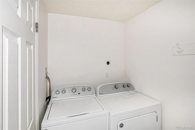 1534 S Ouray Cir Unit B, Aurora, CO 80017 - washroom with washing machine and clothes dryer
