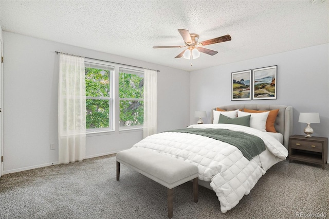 1534 S Ouray Cir Unit B, Aurora, CO 80017 - bedroom with carpet floors, a textured ceiling, ceiling fan, and baseboards