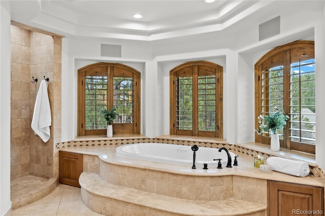 662 Yankakee Dr, Castle Rock, CO 80108 - bathroom with plenty of natural light, visible vents, tile patterned flooring, and a garden tub