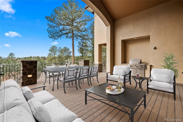 662 Yankakee Dr, Castle Rock, CO 80108 - deck with an outdoor hangout area, outdoor dining space, and area for grilling