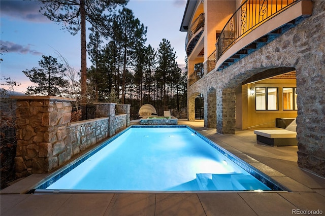 662 Yankakee Dr, Castle Rock, CO 80108 - view of pool with a pool with connected hot tub and a patio